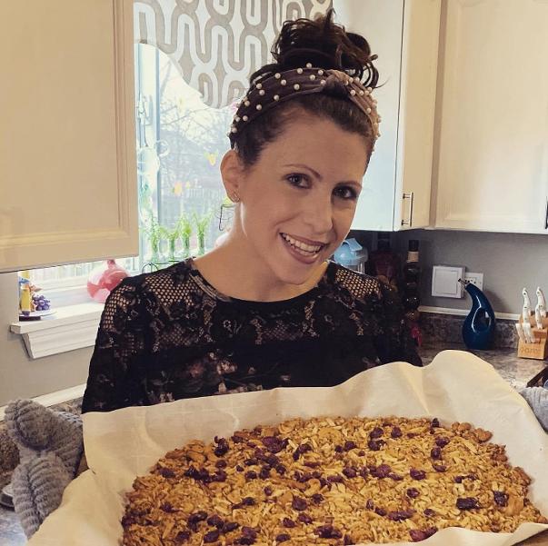 Adua with homemade orange granola trail mix inspired by Chasing Waterfalls